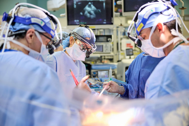 surgeons working on patient