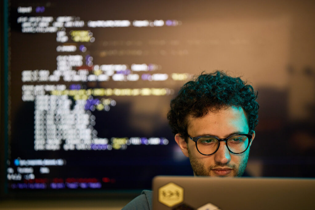 man looking at computer screen